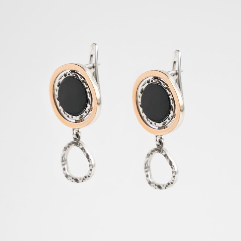 Silver earrings: Black eyes
